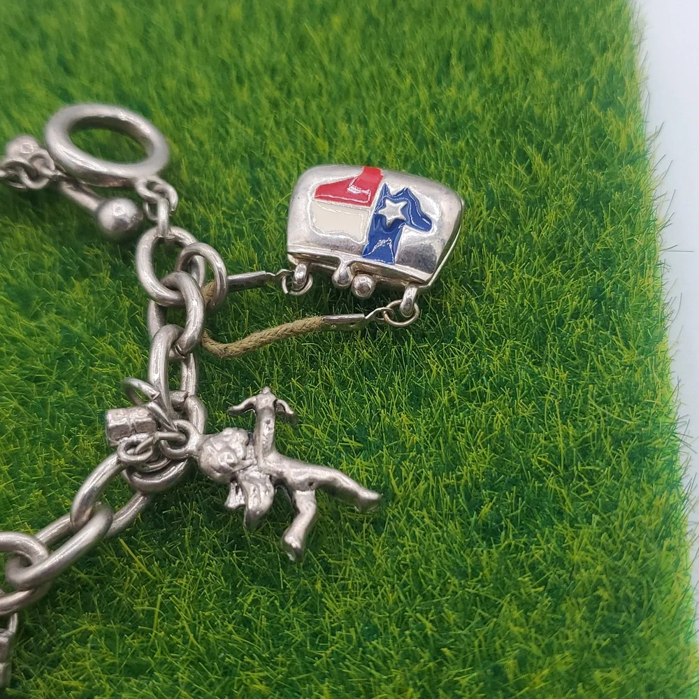 Silver Tone Charm Bracelet with Texas and Angel Charms‎ B3025
